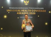 Bupati Bangka Barat Terima Penghargaan UHC Award
